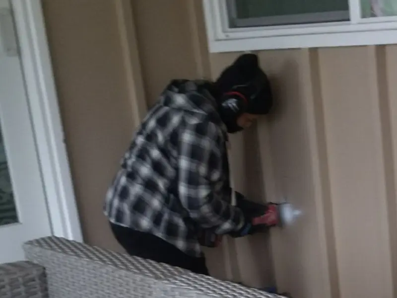 Professional electrician installing an exterior outlet in Tomahawk